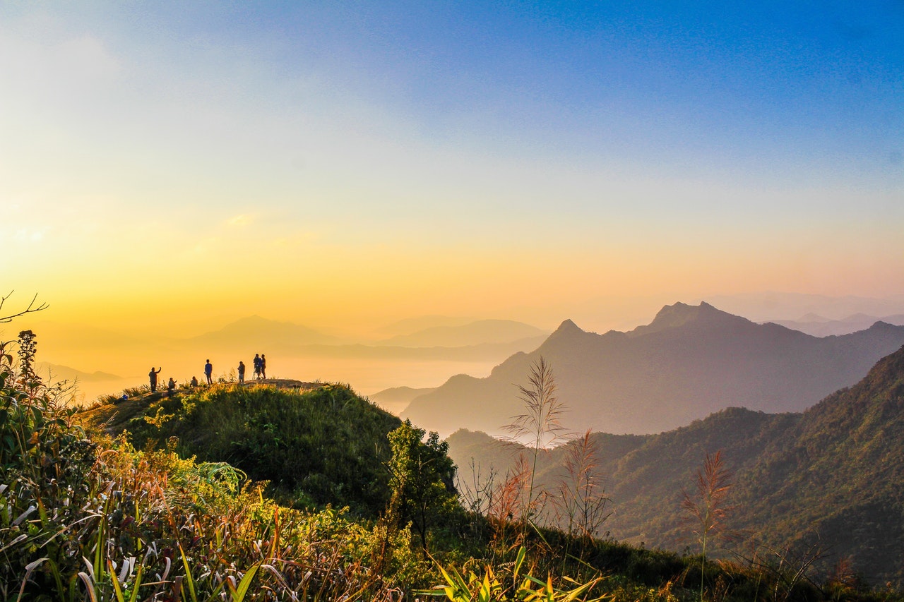 ProyectCam Photo Of People Standing On Top Of Mountain Near Grasses 733162